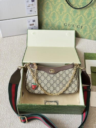 شنطة يد قوتشي