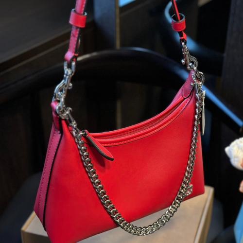 شنطة يد كوتش