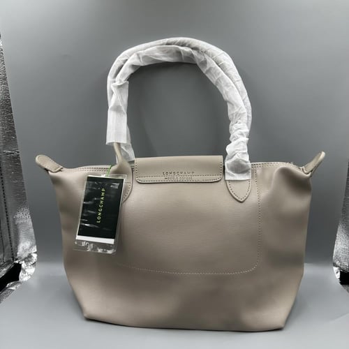 شنطة لونج شامب جلد بيج