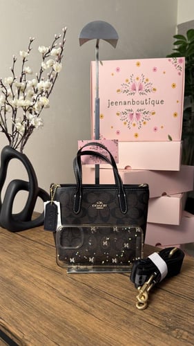 شنطة يد كوتش أسود