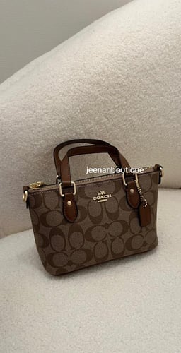 شنطة يد كوتش