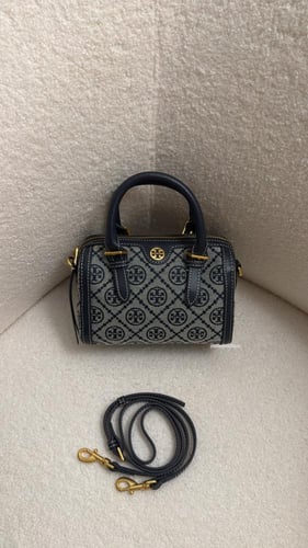 شنطة يد توري بورش