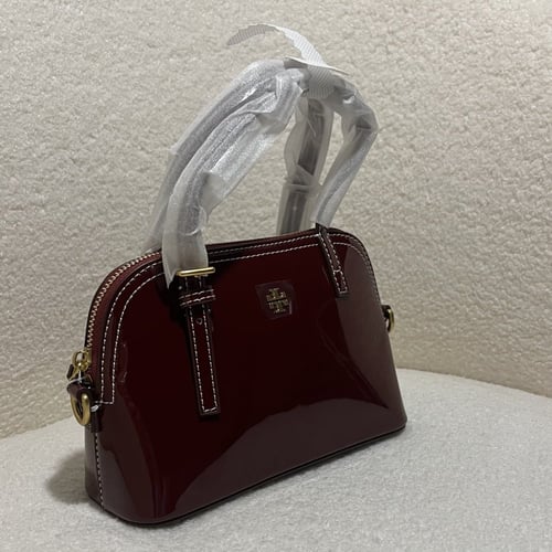 شنطة يد توري بورش لامع