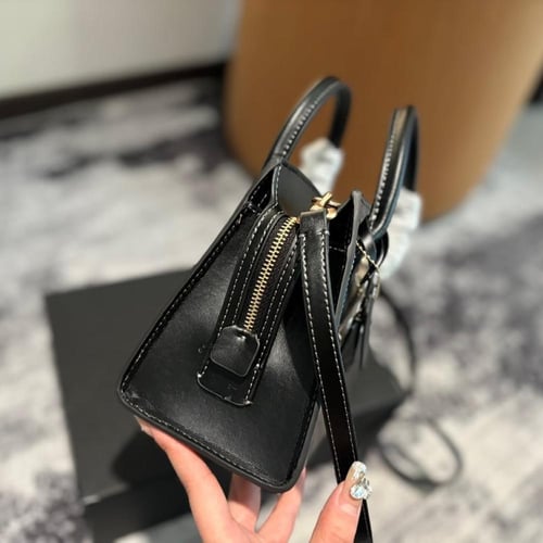 شنطة يد كوتش أسود