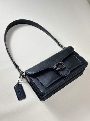 شنطة كوتش تابي كريستال