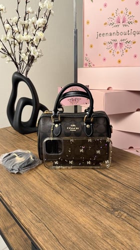 شنطة يد كوتش بني غامق