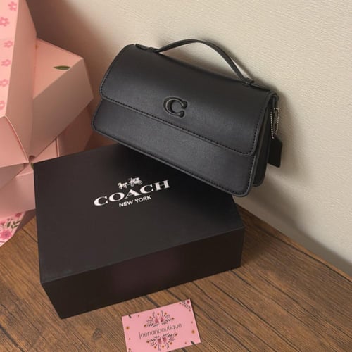 شنطة يد كوتش أسود