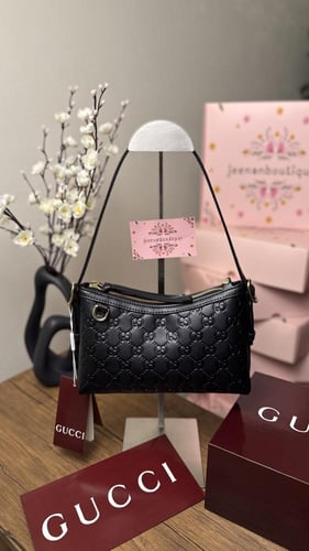 شنطة قوتشي أسود