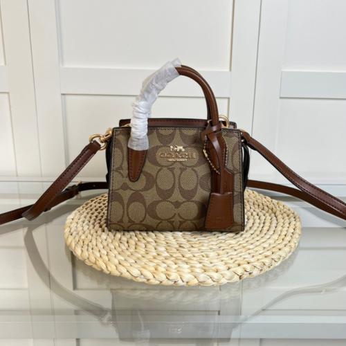 شنطة يد كوتش ميني