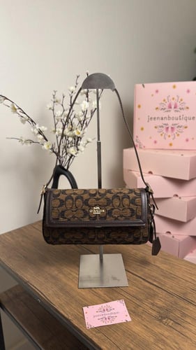 شنطة كتف كوتش بني