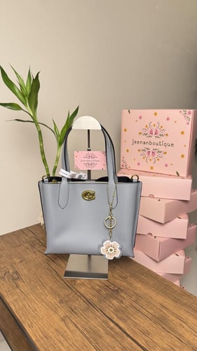 شنطة يد كوتش