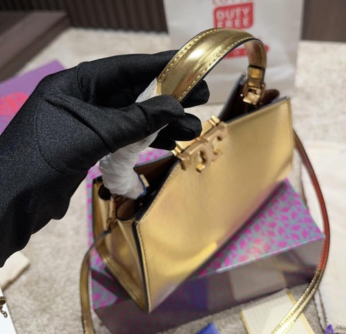 شنطة يد توري بورش ميني ذهبي