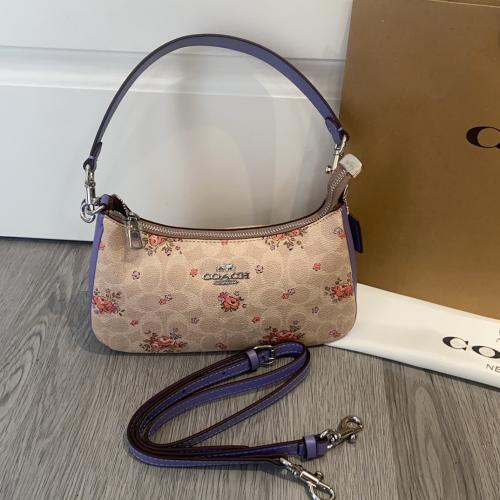 شنطة يد كوتش