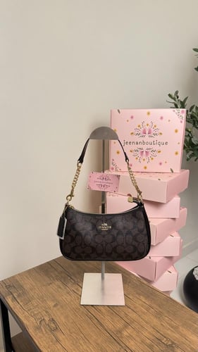 شنطة كتف كوتش بني