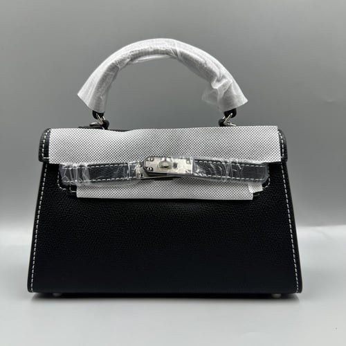 شنطة أسود خيط ابيض