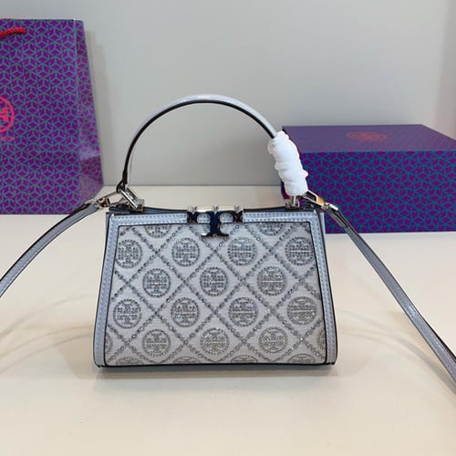 شنطة يد توري بورش ميني لامع