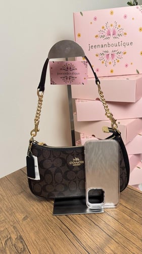 شنطة كتف كوتش بني