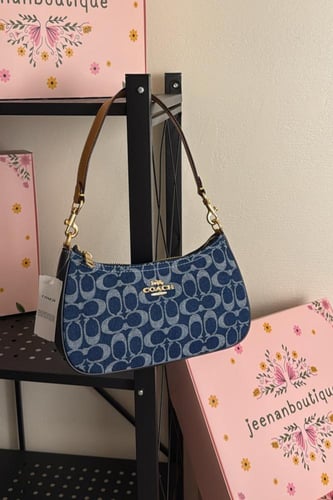 شنطة كتف كوتش