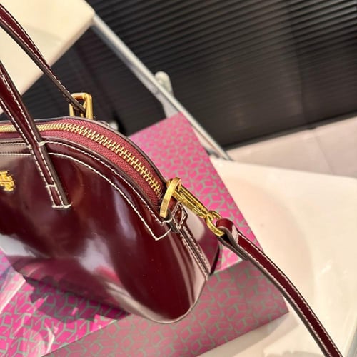 شنطة يد توري بورش مطفي