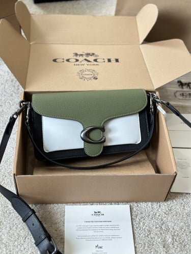 شنطة كوتش تابي