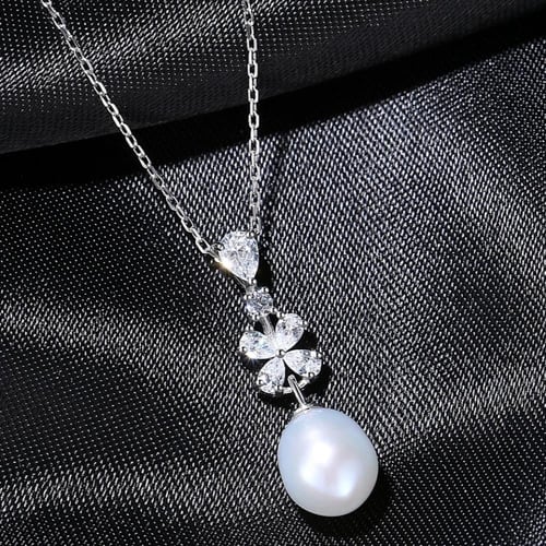 طقم اللؤلؤ والزركون اللامع (فضة إسترليني 925)