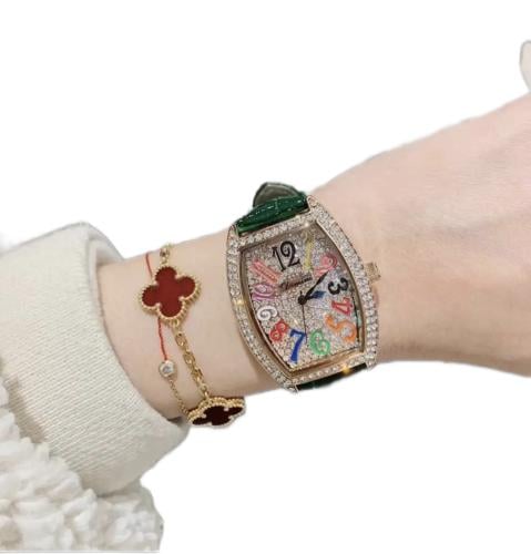Rose gold watch with green strap