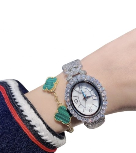 Silver watch encrusted with crystal