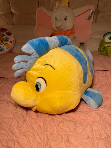 دمية سمكة اريل فلتة