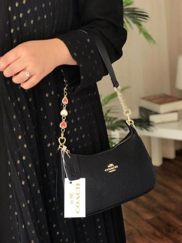 حقيبة كتف تيري من كوتش باللون الاسود