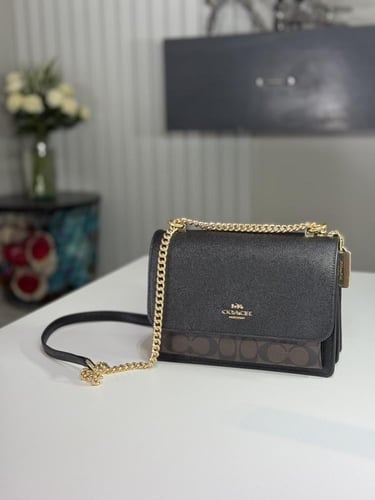 شنطة كوتش كلير سجنشر كانفاس Klare Crossbody Bag In...