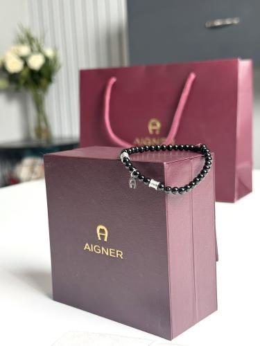 اسوار اجنر المميز اليومي روقيرو اسود بتفاصيل فضيه Ruggero Aigner men bracelet black