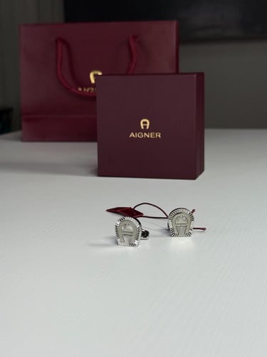 اجنر كبك فضي بلوقو اجنر وشكل حذوه بتفاصيل مموجه -...