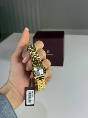 ساعة اجنر بيسا ذهبيه بمينا ابيض Aigner Women's Pis...