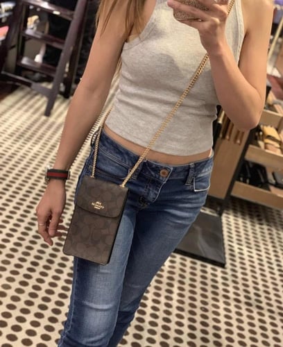 شنطة كوتش هاتف لميتد بلون بني سجنشر واسود NORTH/SO...