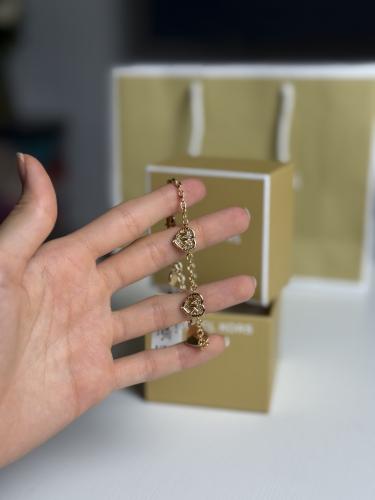 اسوار مايكل كورس ذهبي بقلوب مرصعه بالكريستاال micheal kors hearts bracelet gold