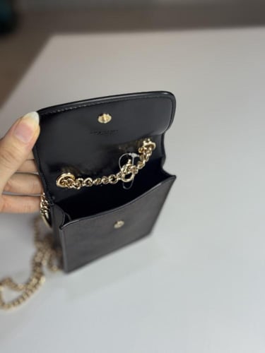 شنطة كوتش هاتف لميتد بلون بني سجنشر واسود NORTH/SO...