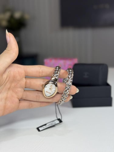 ساعة جست كافالي بشكل ثعبان بلون ذهبي وروز قولد - j...