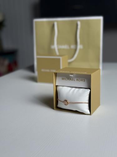 اسوار مايكل كورس روز قولد باللولو micheal kors rose gold pearl bracelet