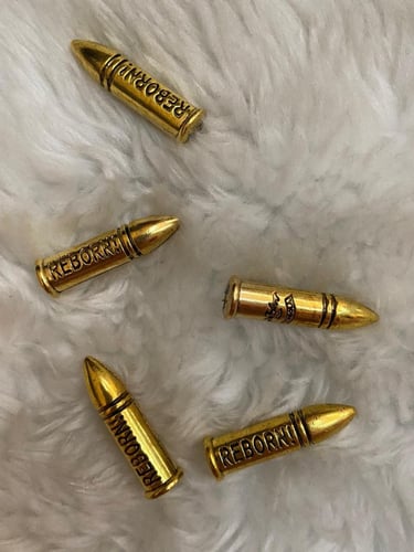 رصاص زينه للمحزم حديد ذهبي وزن ثقيل عدد 12 حبه