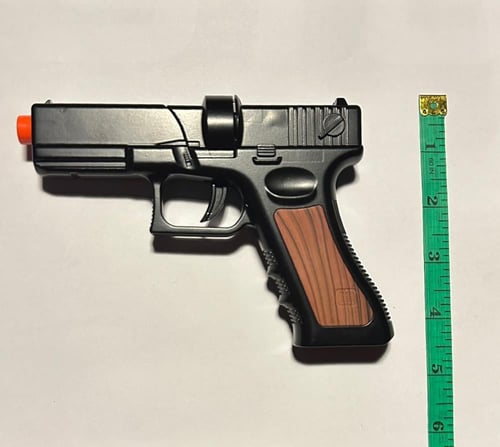 مسدس لعبة حديد نص أسود طرطعان