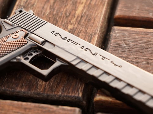 ميدالية فرد مسدس حديد