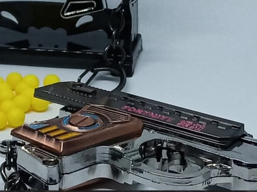 ميداليه مسدس خرز حديد مقاس الاصبع