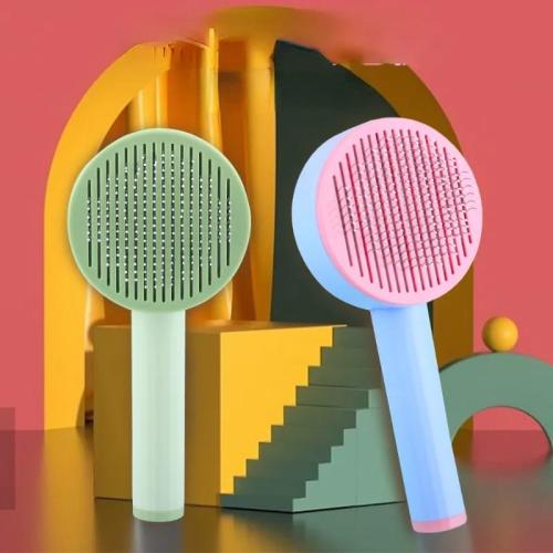 مشط قطط والكلاب ملون