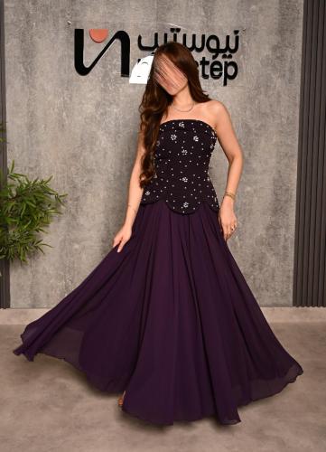 فستان سهرة أنيق باللون البنفسجي الداكن بتصميم فاخر
