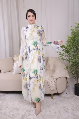 فستان طويل بأكمام نقوش زهرية بألوان هادئة