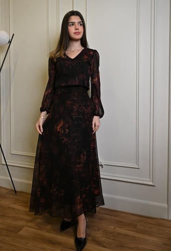 طقم تنورة وبلوزة بنقشة تجريدية ملونة