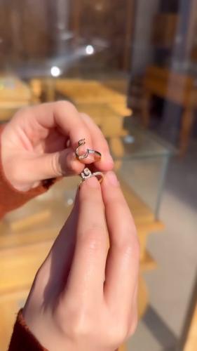 The intertwined letter ring