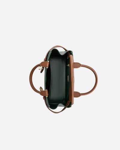 شنطة نسائية أنيقة بلون أخضر من امزوري