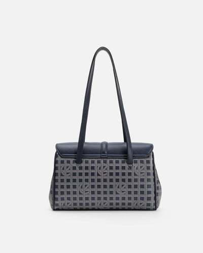 شنطة نسائية مميزة بلون أزرق من امزوري