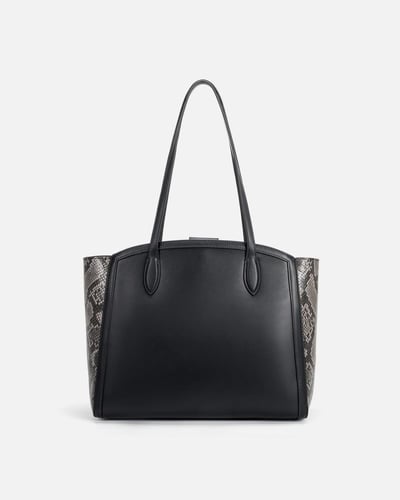 شنطة نسائيه من الجلد الأسود